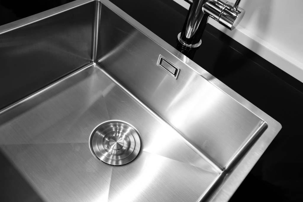 Stainless steel sinks are still some of the most sought after modern kitchen sink designs.