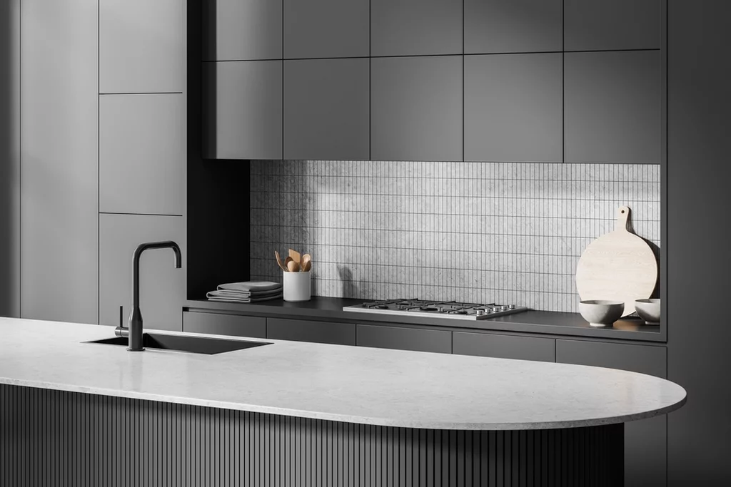 A small range in a modern, gray kitchen.